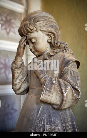 Picture and image  of the Realistic young grieving girl stone funary monument sculpture  commissioned by Enrico Amerigo for his sisters memory. beside Stock Photo