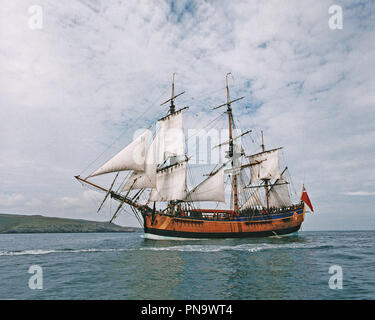 HM Bark Endeavour replica in Fishguard Bay Harbour. Pembrokeshire Wales UK while circumnavigating the world in 1997 Stock Photo