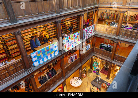 Galleried interior of Liberty of London department store with colourful fabrics, Great Marlborough Street and Regent Street, West End, London W1 Stock Photo