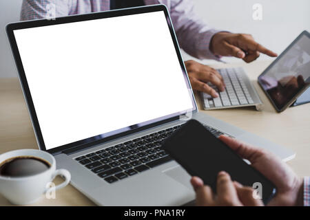 Laptop with blank screen on table. Workspace background new project on laptop computer with blank copy space screen for your advertising text message Stock Photo