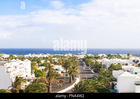COSTA TEGUISE, SPAIN  DECEMBER 12, 2017: Ocean view from Costa Teguise village on December 12, 2017 on the island of Lanzarote, Spain.  Costa Teguise Stock Photo