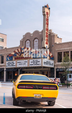 BIRMINGHAM, MI/USA - AUGUST 16, 2018: A Dodge Challenger car in front of the historic Birmingham Theatre, at the Woodward Dream Cruise. Stock Photo