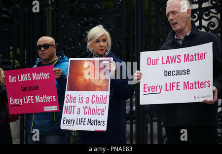 Anti abortion demonstrators, including Bernadette Smyth (centre) outside the High Court in Belfast where the court is to hear a judicial review taken by a mother who was prosecuted for securing abortion pills for her daughter.