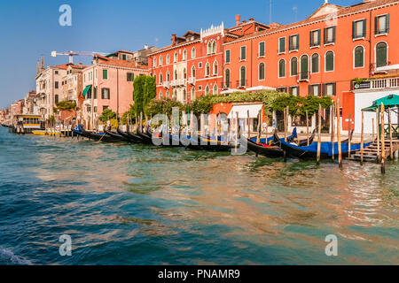 Grand Canal, Venice, Italy showing gondolas parked in front of historic buildings. Stock Photo
