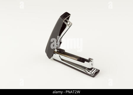 new stapler for stapling papers on a table Stock Photo