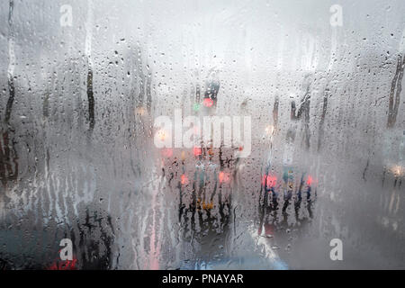 London,UK weather- on  double decker bus-heavy traffic trough steamy window