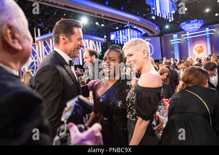 Hugh Jackman, nominated for BEST PERFORMANCE BY AN ACTOR IN A MOTION PICTURE – COMEDY OR MUSICAL for his role in 'The Greatest Showman,' Tarana Burke and Michelle Williams, nominated for BEST PERFORMANCE BY AN ACTRESS IN A MOTION PICTURE – DRAMA for her role in 'All the Money in the World,' during the 75th Annual Golden Globe Awards at the Beverly Hilton in Beverly Hills, CA on Sunday, January 7, 2018.  File Reference # 33508 565JRC  For Editorial Use Only -  All Rights Reserved Stock Photo