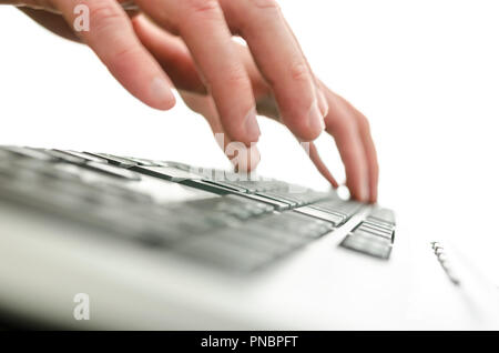 Closeup of blurred  male hands typing on computer keyboard. Stock Photo