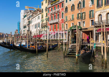 Venice, Italy - March 22, 2018: Gondola parking at  Grand Canal in Venice, Italy Stock Photo