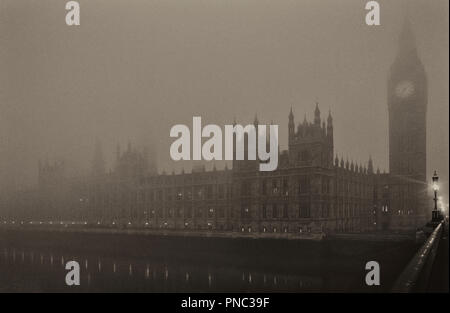 The Palace of Westminster shrouded in fog, London, England, UK Stock Photo