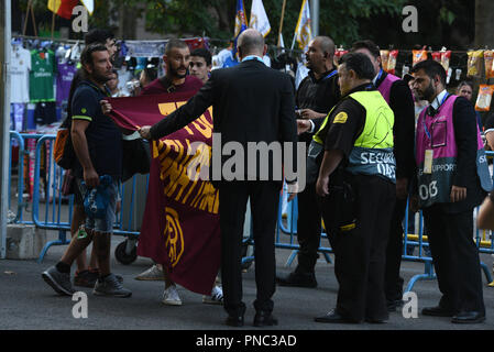 Madrid, Spain. 19th Sep, 2018. Stewards check Roma fans with a flag ahead of the Group G match of the UEFA Champions League between Real Madrid and AS Roma at Santiago Bernabeu. Credit: Jorge Sanz/Pacific Press/Alamy Live News Stock Photo