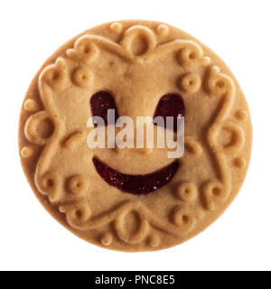 smiling cookie filled with jam, isolated on white background Stock Photo