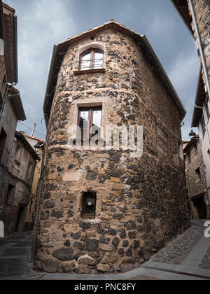 Vertical view of a typical lava rocks building in Castellfolit de la Roca Stock Photo