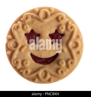 smiling cookie with star eyes filled with jam, isolated on white background Stock Photo