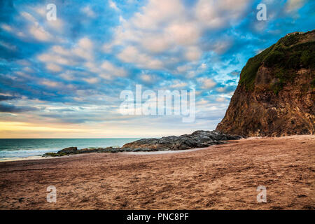 Sunset over the beach at Tresaith in Ceredigion, Wales. Stock Photo