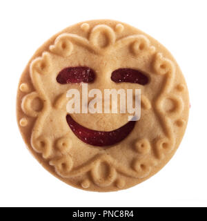 smiling cookie filled with jam, isolated on white background Stock Photo