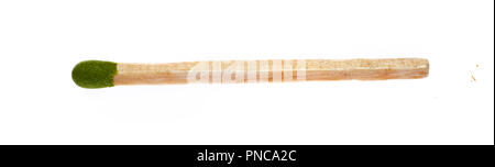 Wooden matchstick that has green head isolated on white background Stock Photo