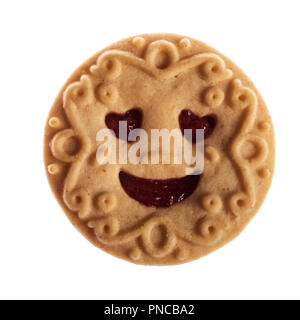 smiling cookie with heart eyes filled with jam, isolated on white background Stock Photo