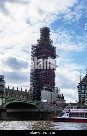 Elizabeth Tower known as Big Ben with temporay scaffolding whilst undergoing refurbishment. The clock face is still visible. Stock Photo