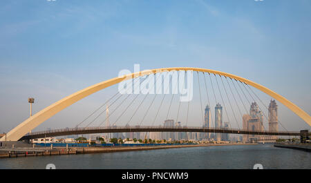 View of Tolerance Bridge, a footbridge crossing the new Dubai Water Canal a waterway that connects into Dubai Creek and the sea. UAE, United Arab Emir Stock Photo