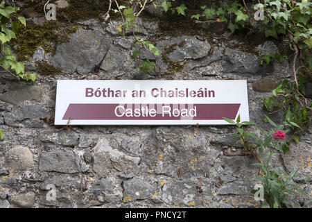 A street sign for Bothar an Chaisleain, meaning Castle Road in the ...