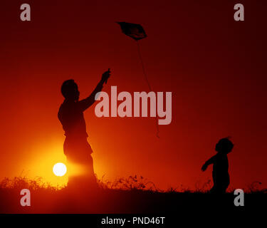 1980s ANONYMOUS SILHOUETTE FATHER AND SON FLYING KITE AGAINST WHITE YELLOW SUN RED SKY BACKGROUND - kj8975 PHT001 HARS NOSTALGIA SUNSET OLD FASHION GRAPHIC 1 SKYLINE JUVENILE TEAMWORK SONS SOLAR JOY LIFESTYLE PARENTING CELEBRATION RURAL GROWNUP HOME LIFE COPY SPACE PEOPLE CHILDREN HALF-LENGTH PERSONS INSPIRATION GROWN-UP CARING MALES FATHERS OUTLINE SINGLE PARENT KITE SUCCESS SINGLE PARENTS HAPPINESS ADVENTURE SILHOUETTED DADS EXCITEMENT LOW ANGLE CONNECTION ANONYMOUS GRAPHIC OUTLINE JUVENILES MID-ADULT MID-ADULT MAN RELAXATION TOGETHERNESS YOUNGSTER OLD FASHIONED Stock Photo