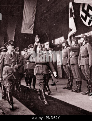 1940 OCTOBER 23 HITLER MARCHES AS FRANCO SALUTES DURING HITLER’S TRIP TO SPAIN ITALY AND FRANCE FROM VON RIBBENTROP PHOTO ALBUM - q74015 CPC001 HARS NATIONALISM POWERFUL WORLD WARS ITALY WORLD WAR WORLD WAR TWO WORLD WAR II DICTATOR SWASTIKA OCCUPATIONS POLITICS UNIFORMS NAZI VISIT WORLD WAR 2 FASCIST ADOLF HITLER PHOTO ALBUM FASCISM TOGETHERNESS BLACK AND WHITE CAUCASIAN ETHNICITY DURING OLD FASHIONED Stock Photo