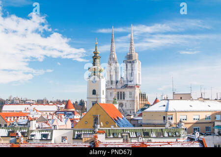 Panoramic view of cathedral in Zagreb, Croatia, from Upper town, winter, snow on roofs Stock Photo