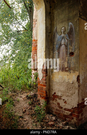 Fresco depicting the Archangel on the wall of a ruined church Stock Photo