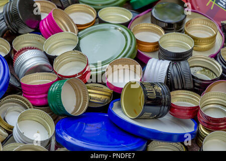 Berlin, Germany, 12.05.2018, enormous quantity of metal alcoholic beverages caps and jar caps in golden, red, green, blue, white, silver etc. Recyclin Stock Photo