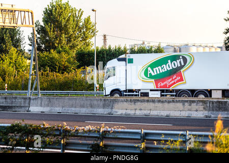 FAENZA (RA), ITALY - SEPTEMBER 20, 2018: truck with AMADORI logo running on highway Stock Photo