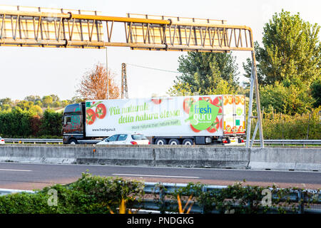 FAENZA (RA), ITALY - SEPTEMBER 20, 2018: truck with FRESHGURU  logo running on highway Stock Photo