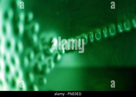 Binary code: digital language emerging from a numerical cloud Stock Photo