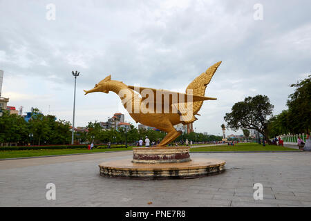 Gilt statue of Hang Meas, the sacred golden bird, in Botum Park, Phnom Penh, Cambodia. Stock Photo