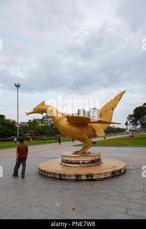 Gilt statue of Hang Meas, the sacred golden bird, in Botum Park, Phnom Penh, Cambodia. Stock Photo