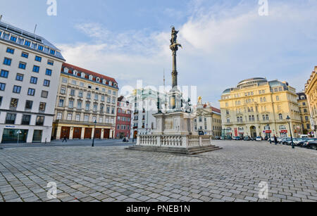 Am Hof square, with Mariensäule statue on front and Bürgerliches Zeughaus in the back. Vienna, Austria Stock Photo