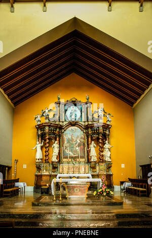 The beautiful, historic alter Inside the church of Holy Trinity in the village of Punat on the Croatian island of Krk in the Adriatic Sea Stock Photo