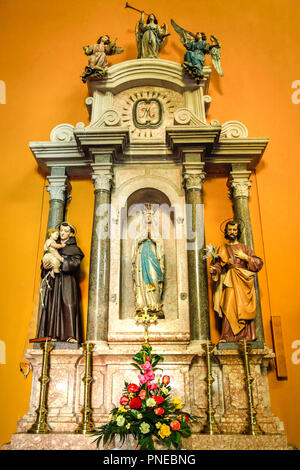 The beautiful, historic alter Inside the church of Holy Trinity in the village of Punat on the Croatian island of Krk in the Adriatic Sea Stock Photo