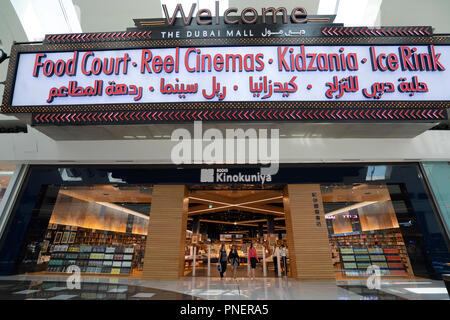 Entrance to the Dubai Mall and Kinokunaya bookstore in Dubai Mall, UAE Stock Photo