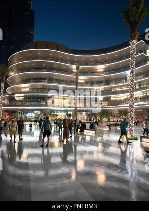 Exterior of Dubai Mall Fashion Avenue with valet parked expensive