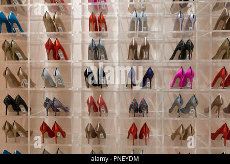 Rows of womens shoes in SJP Sarah Jessica Parker shoe store inside Dubai Mall, UAE Stock Photo