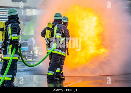 Firefighters in fire fighting, exercise, fire simulator for chemical fires,  fire department Essen, Germany Stock Photo