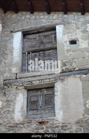 Windows with shutters on an old stone house Stock Photo - Alamy
