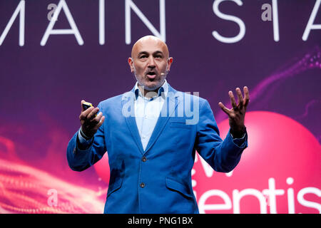 Physicist and broadcaster, Jim Al-Khalili, giving a bief history of Gravity, how it shapes the Cosmos but how we dont completely understand it. on the main Stage, at New Scientist Live Stock Photo