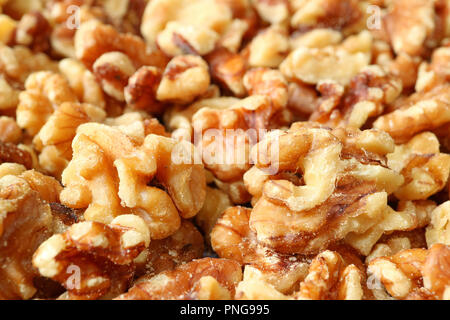 Closed Up Heap of Walnut Kernels for Nut Texture, Background, Banner Stock Photo
