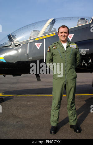 Pilot Matt Barker RAF, Royal Air Force solo BAe Hawk air display pilot with BAe Hawk T1 jet trainer plane at London Southend Airport for the airshow Stock Photo