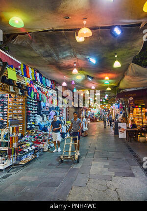 Bodrum, Turkey - July 5, 2018. Citizens working on the streets of Bodrum downtown bazaar. Mugla Province, Turkey. Stock Photo