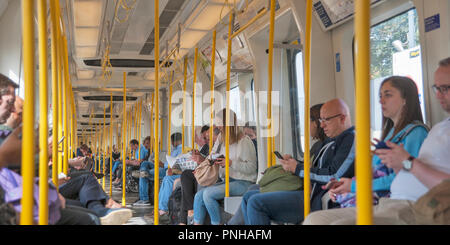 Inside a moving London Underground train on open section of line. Stock Photo