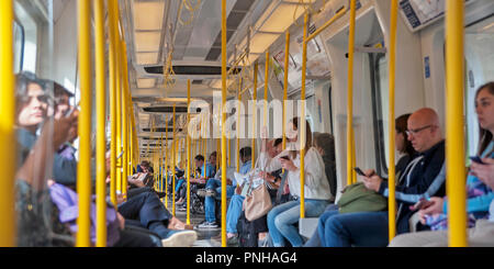 Inside a moving London Underground train on open section of line. Stock Photo