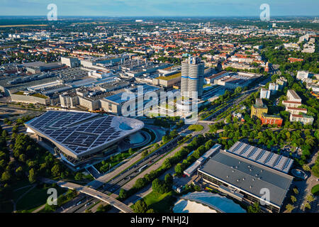 MUNICH, GERMANY - JULY 08, 2018: Aerial view of BMW Museum and BWM Welt and factory and Munich from Olympic Tower. BMW is a famous German luxury car a Stock Photo